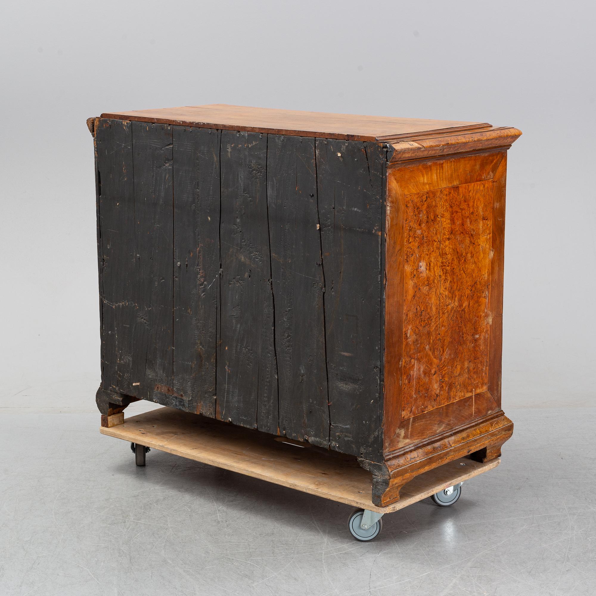 A Swedish root veneered late baroque chest of drawers, first half of the 18th century.