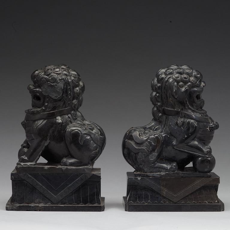 A pair of Chinese buddhist lions in stone, 20th Century.