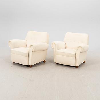 A pair of Danish 1940s armchairs.