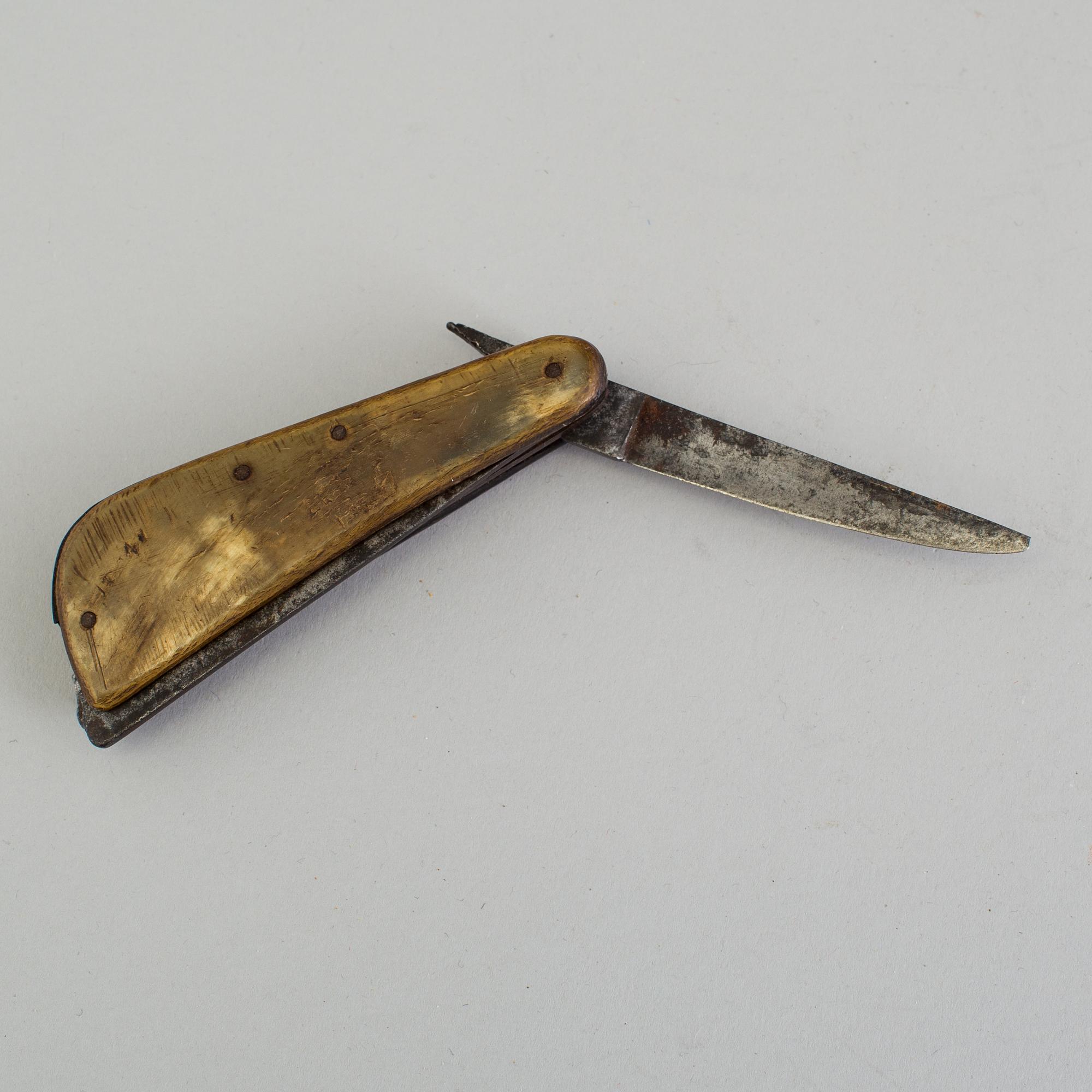 An 18th century iron folding knife for letting blood.