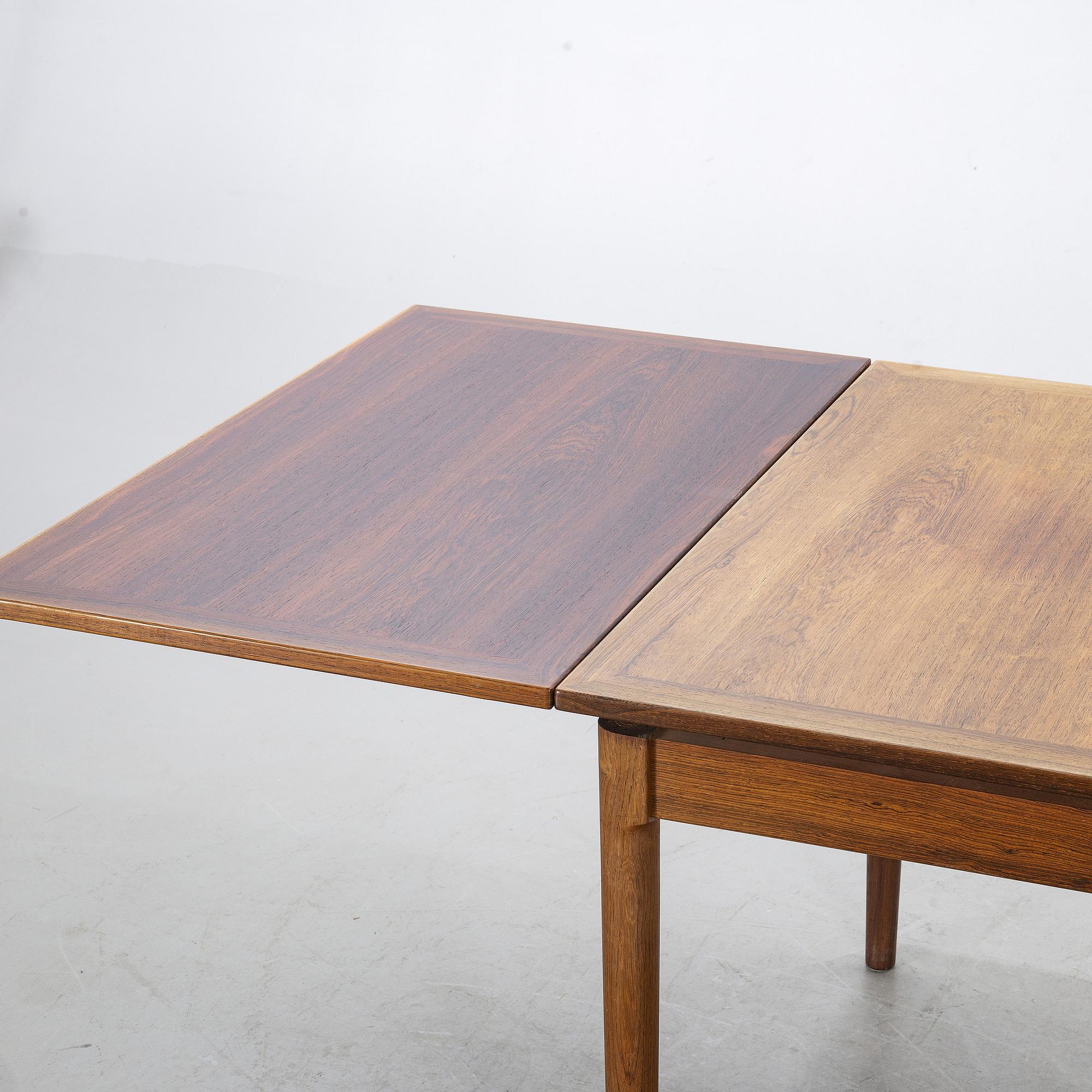 A Table from Slagelse Möbelvaerk A/S and 4 chairs, Niels Otto Møller, JL Møller. Denmark, 1960's.