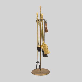 A brass fire set, 20th century.
