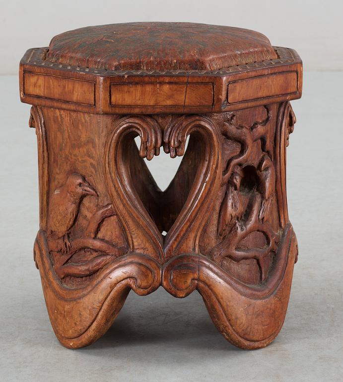 An Art Noveau sculptured pine stool probably by Knut Fjaestad, Sweden early 1900's.