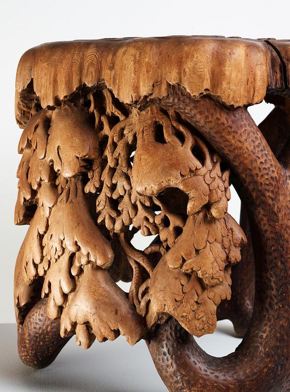 Knut Fjaestad, A Knut Fjaestad Art Nouveau sculptured pine table, Sweden ca 1900.