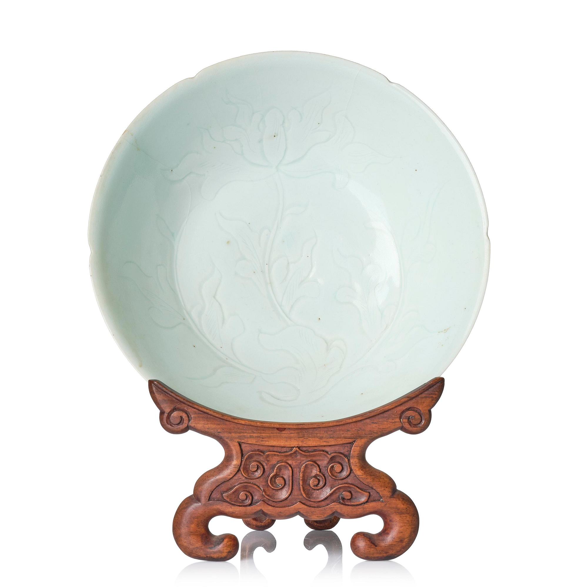 A carved qingbai foliate bowl, Song dynasty (960-1279).