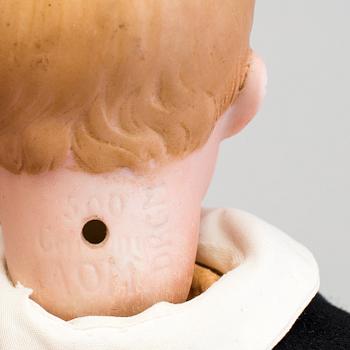 A bisque headed character doll 500 by Armand Marseille, Germany, ca 1910.