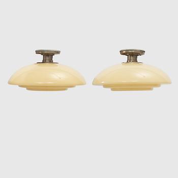 Harald Notini, a pair of ceiling lamps, model "10755", Arvid Böhlmarks Lampfabrik, 1930s.