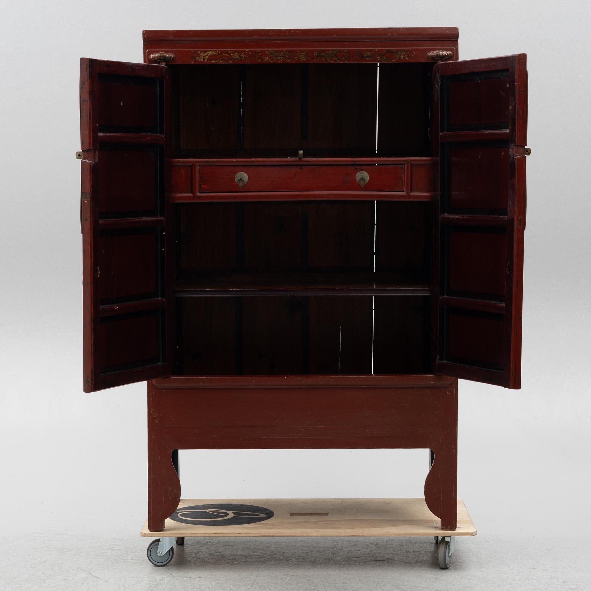 A 20th century cabinet, China.