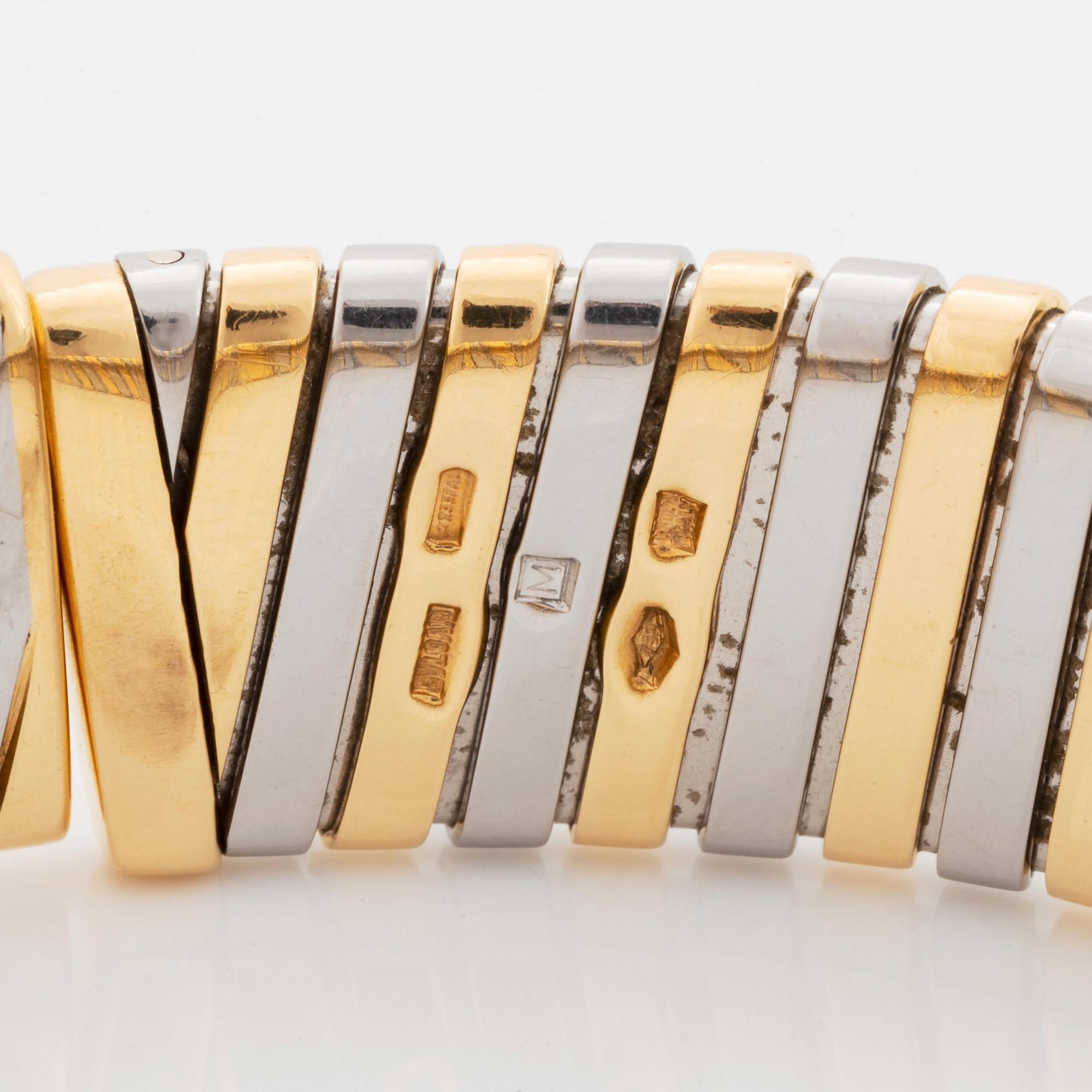 A Bulgari "Tubogas" bracelet in 18K gold and steel.