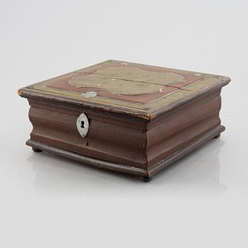 A wooden box, Sweden, dated 1776.