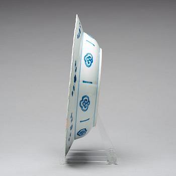 A large blue and white deep dish, Qing dynasty, with Kangxi six character mark and period (1662-1722).