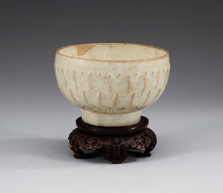 A pale celadon lotus shaped bowl, Song dynasty.