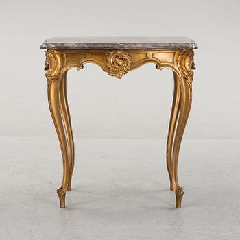 A rococo style table, around 1900.