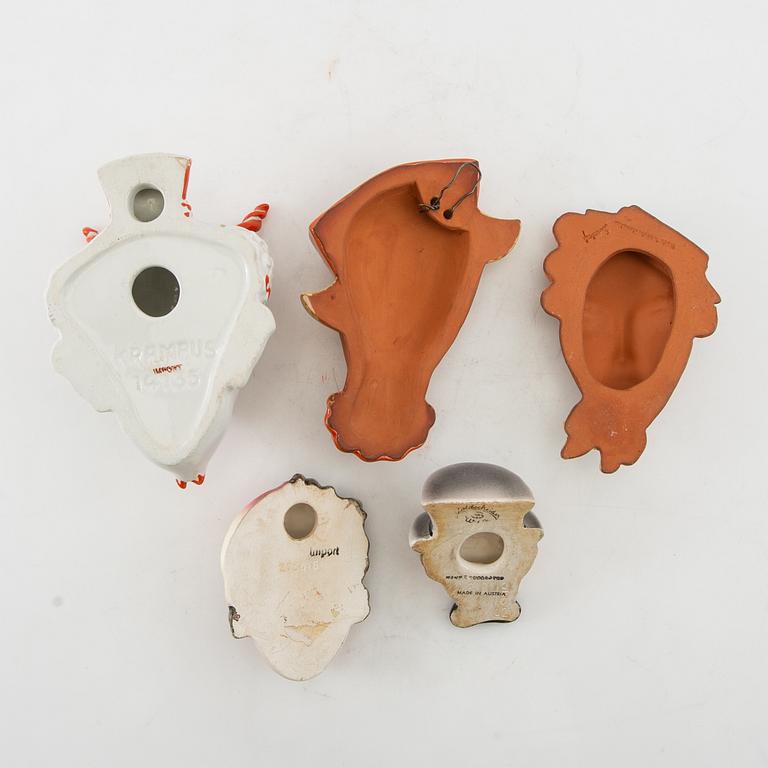 Wall masks 5 pcs including Goldscheider mid-20th century porcelain/terracotta.