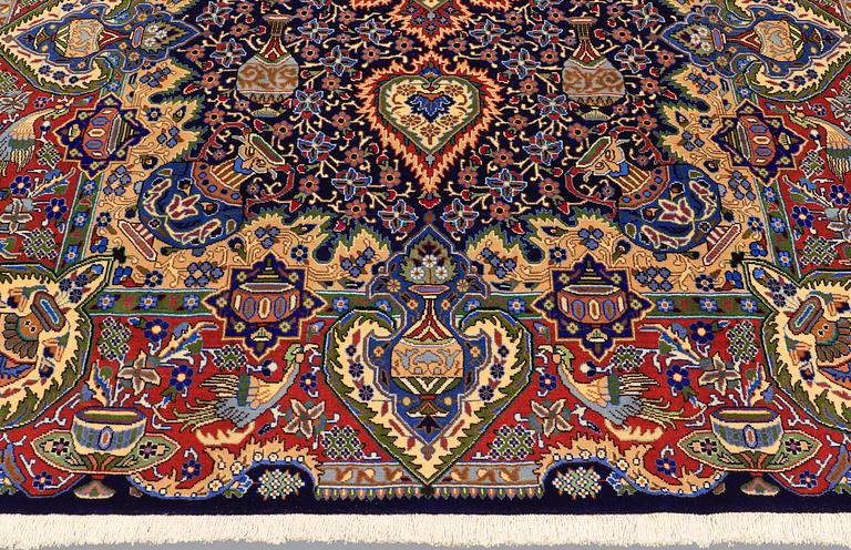 A carpet, Figural Kashmar, ca 315 x 203 cm.