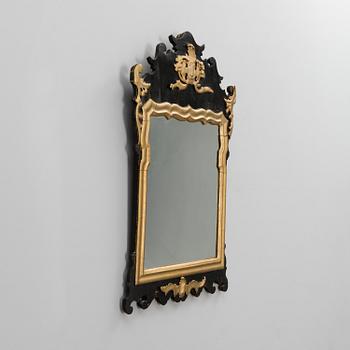 An 18th century rococo mirror.