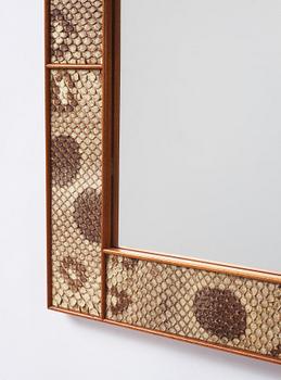 Josef Frank, a snakeskin framed mirror, Firma Svenskt Tenn, Sweden, executed in 1940.