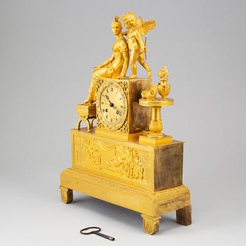 A French Empire pendulum clock, early 19th century.