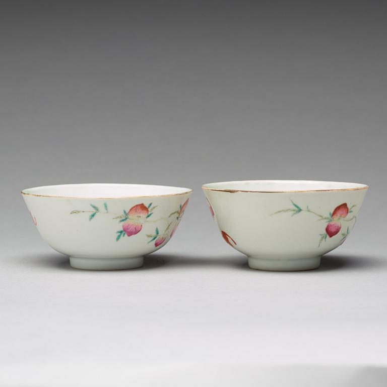 A pair of famille rose 'nine peaches' bowls, Qing dynasty, 19th century, with a 'Shende Tangzhi' mark.