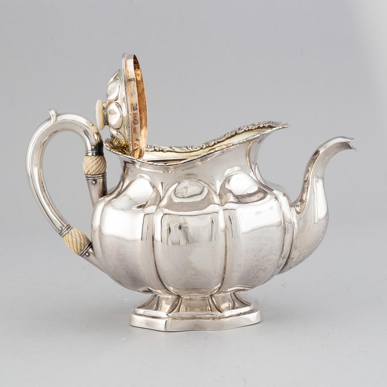 A Russian 19th century parcel-gilt silver tea-pot, mark of Adolf Sper, St. Petersburg 1837.