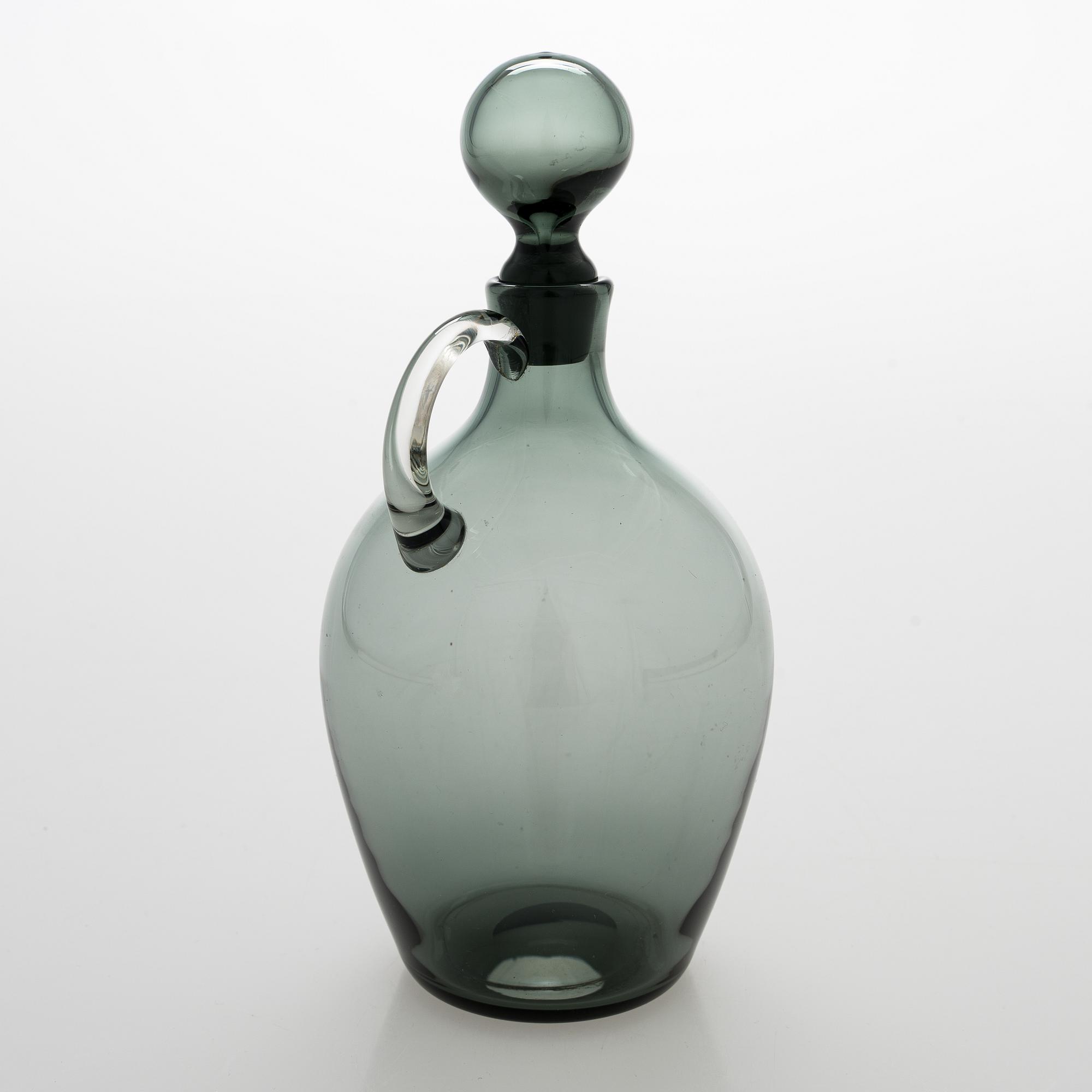 Saara Hopea,  A glass carafe and six drinking glasses, Nuutajärvi, Finland. Design years 1959 and 1958.