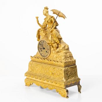 A Late Empire table clock, 19th century.