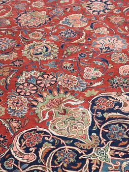 SEMI-ANTIQUE KASHAN. 394 x 309,5 cm.