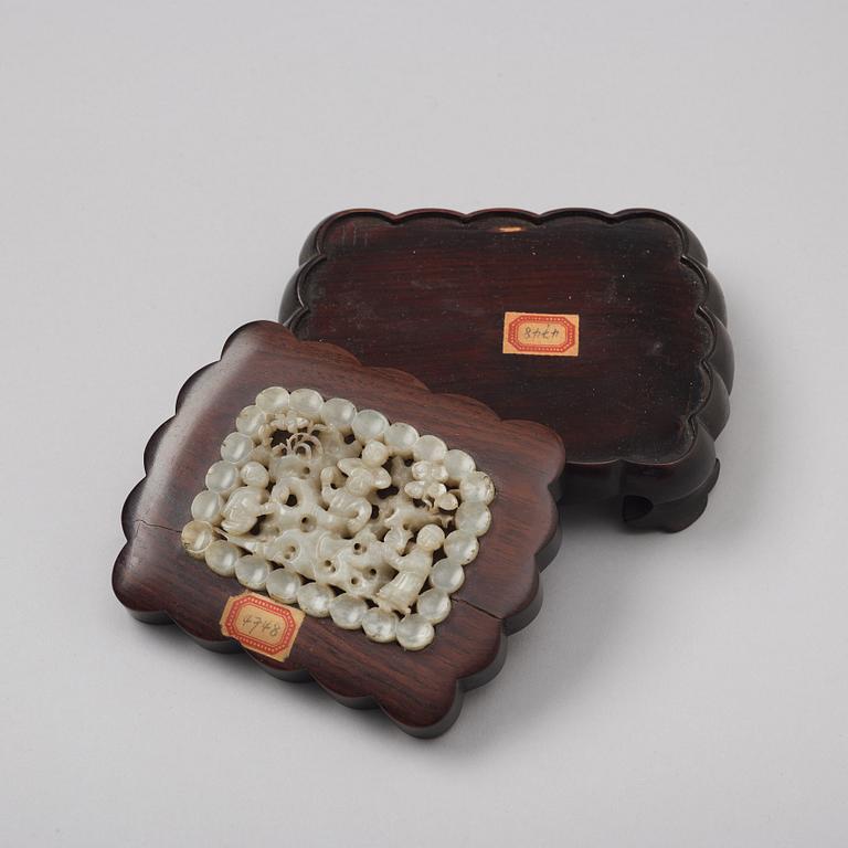 A group of four boxes with covers, China, early 20th Century.