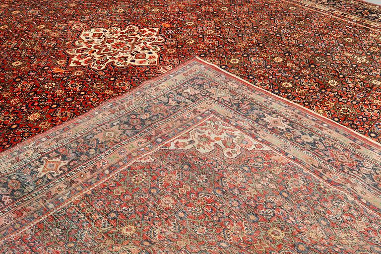 A carpet, Hosseinabad, approx. 510 x 384 cm.