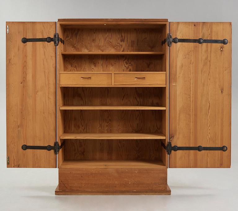 An Axel Einar Hjorth 'Lovö' stained pine cabinet, Nordiska Kompaniet, Sweden 1930's.