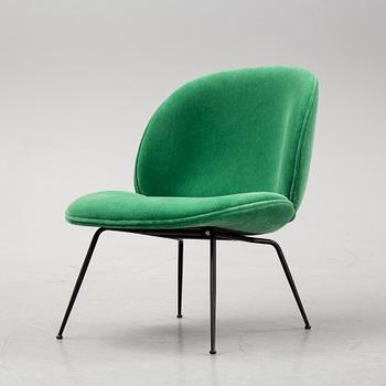 A 'Beetle Lounge Chair' by GamFratesi for Gubi, designed 2013.