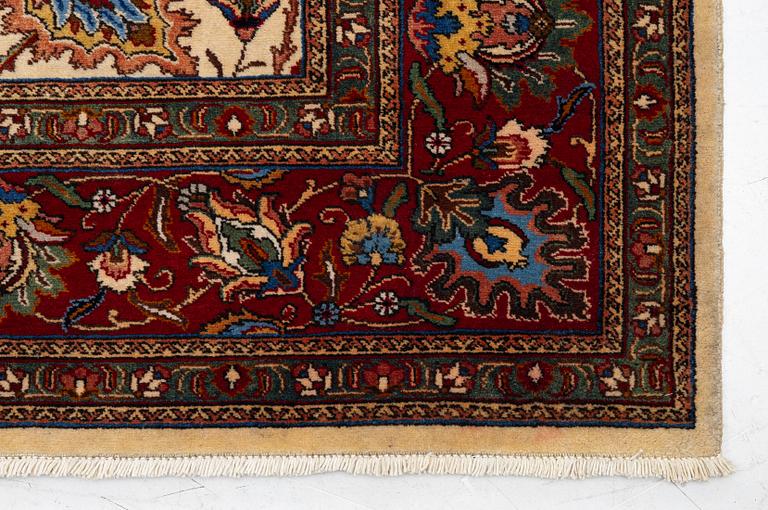 A Tabriz carpet, Northwestern Iran, of Safavid 'palmette' design, c, 483 x 302 cm.