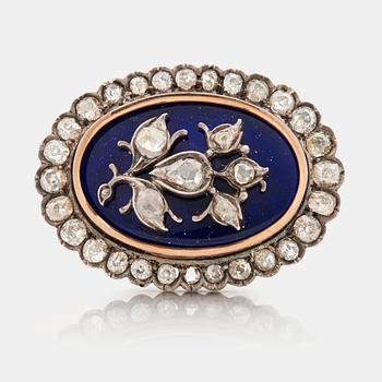 A blue enamel, rose-and old cut diamond brooch. Early 19th century.