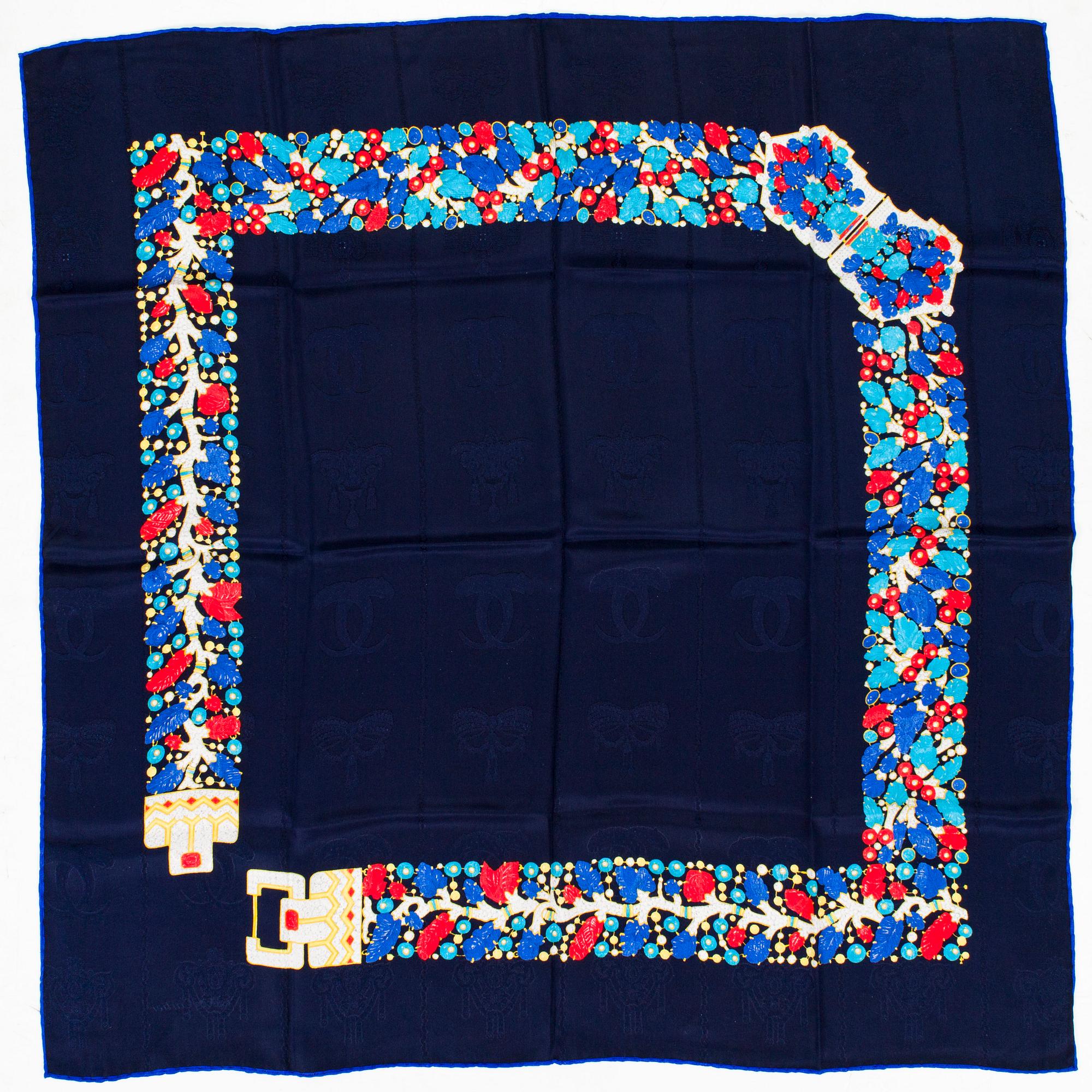 must de Cartier, a silk scarf.