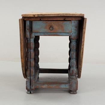 A 19th Century painted gate leg table.