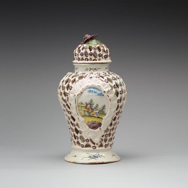 A Magdeburg faience Ajour vase with cover, 18th Century.