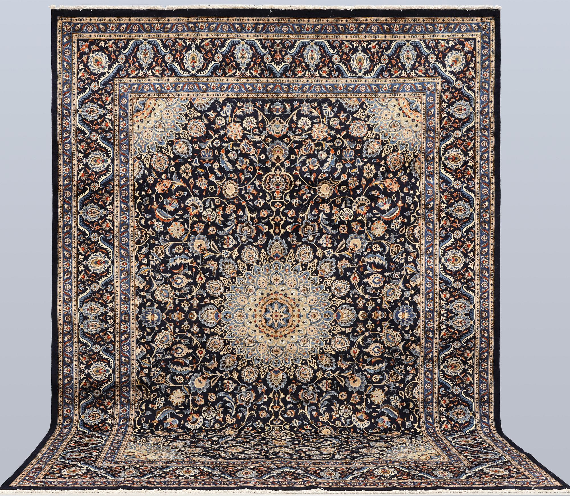 A Keshan carpet, approx. 400 x 295 cm.