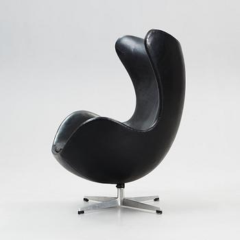 An Arne Jacobsen black leather 'Egg' chair, Fritz Hansen, Denmark 1964.