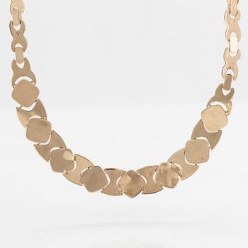 A 14K gold necklace, with diamonds totalling approx. 0.90 ct. Finnish import marks.