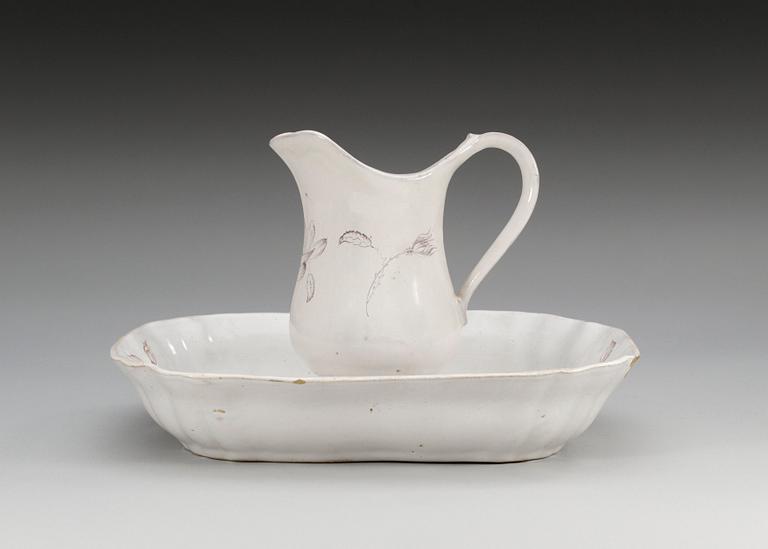 A faiance ewer and basin, 18th Century.