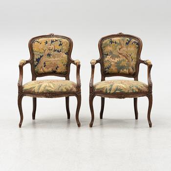 A pair of Rococo style armchairs, around 1900.