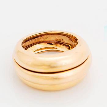 An 18K gold Cartier ring.