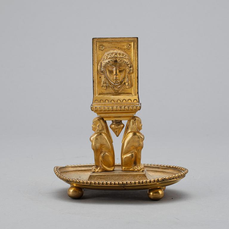 TÄNDSTICKSSTÄLL, empirestil, omkring 1900.