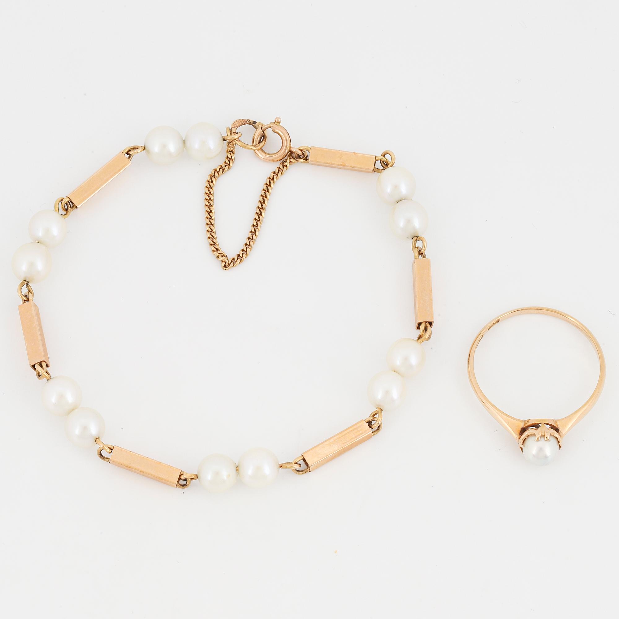 18K gold pearl bracelet and ring.