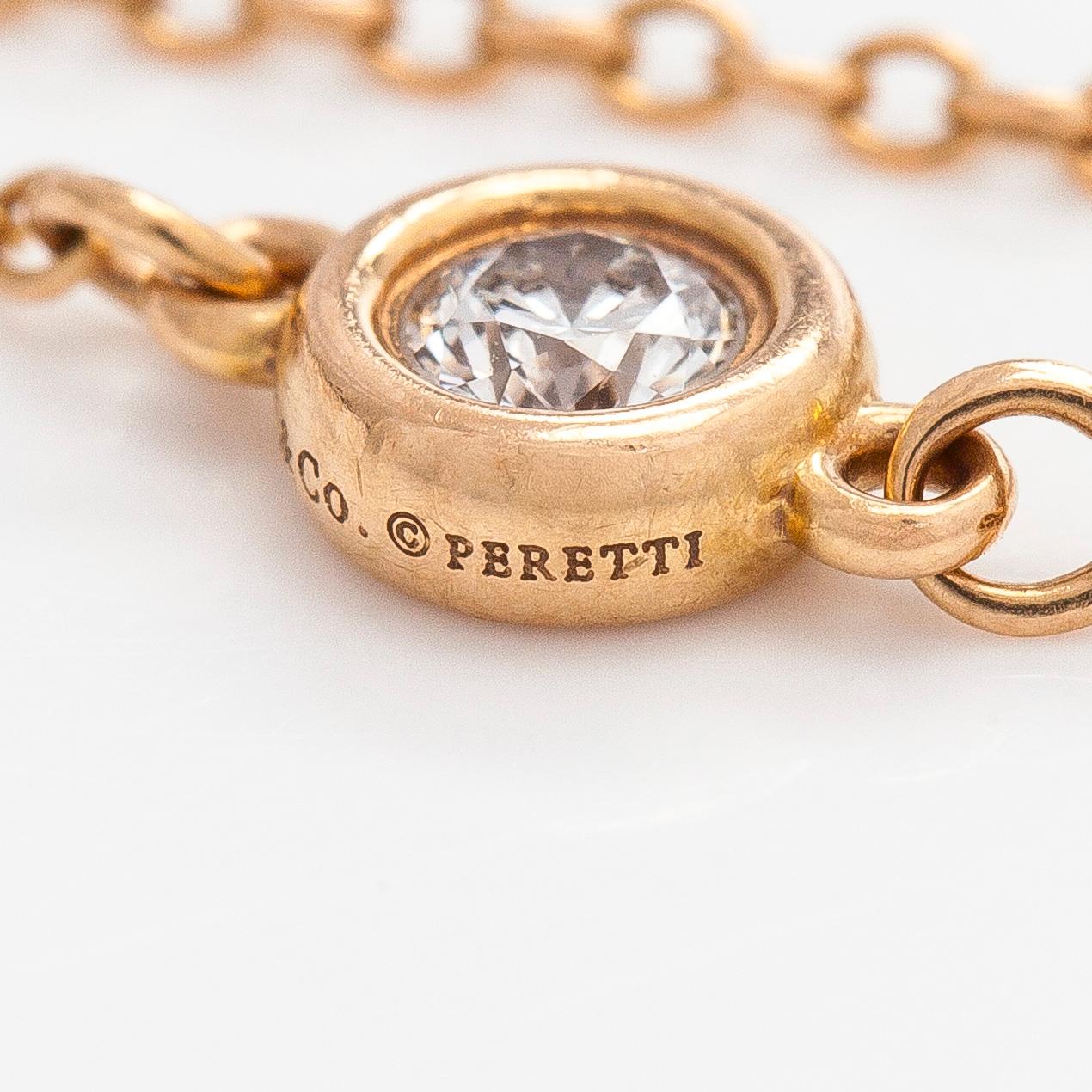 Tiffany & Co, Elsa Peretti, an 18K gold 'Diamonds by The Yard' ring with a brilliant-cut diamond.