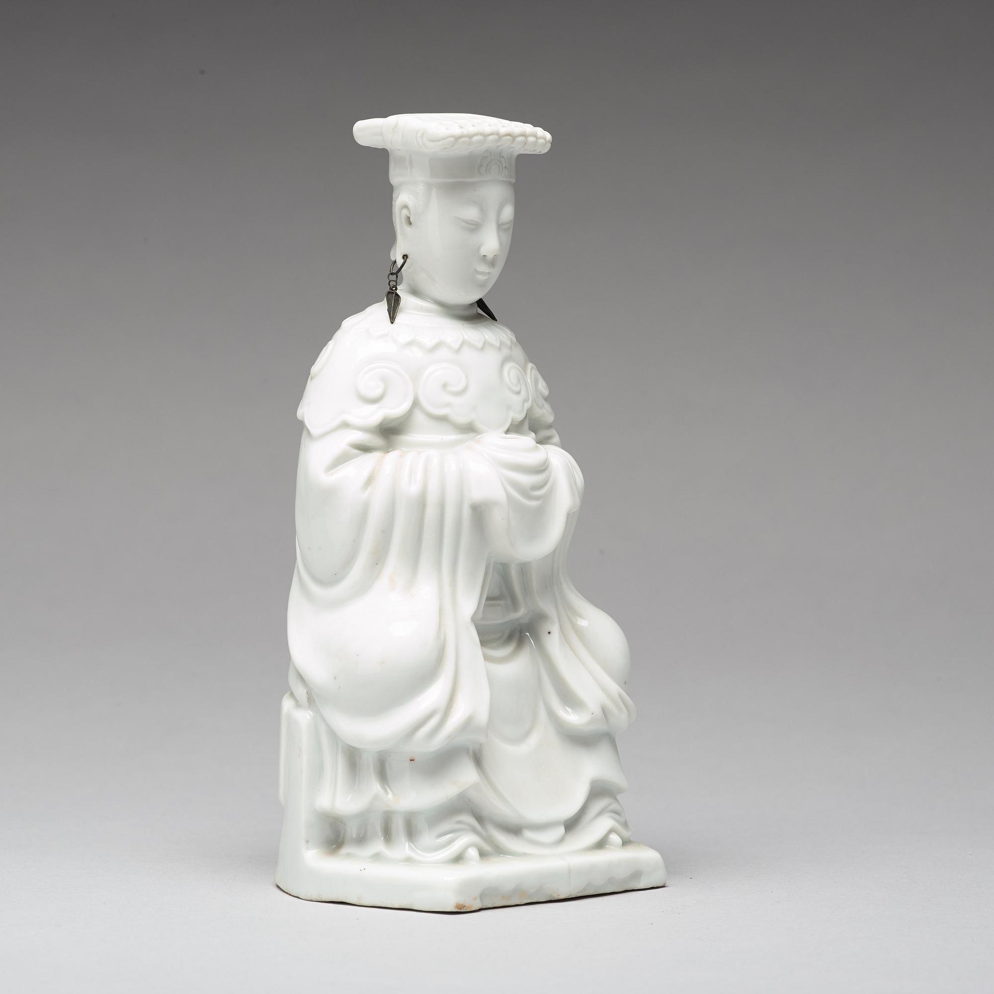 A blanc de chine figure of a deity, Qing dynasty, 19th Century.