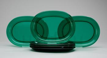 231. A set of six Josef Frank green glass dinner plates.