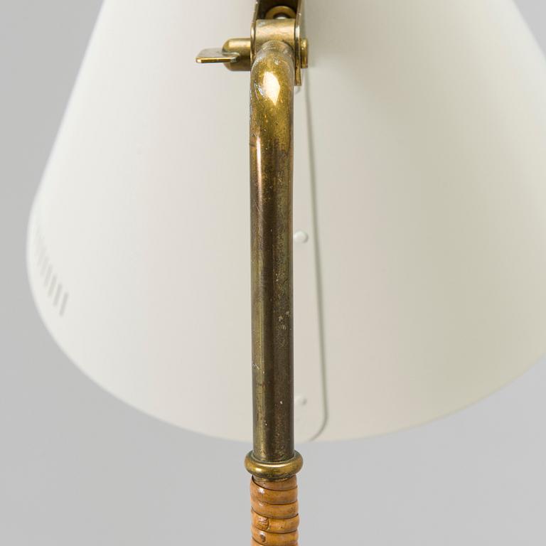 Paavo Tynell, a mid-20th century K10-10 floor lamp for Taito.