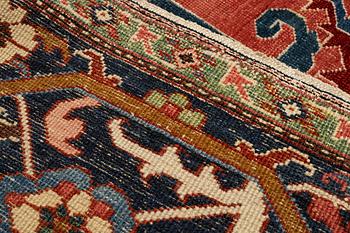 A carpet, antique Heriz, a so-called Serapi, ca 360 x 321 cm.