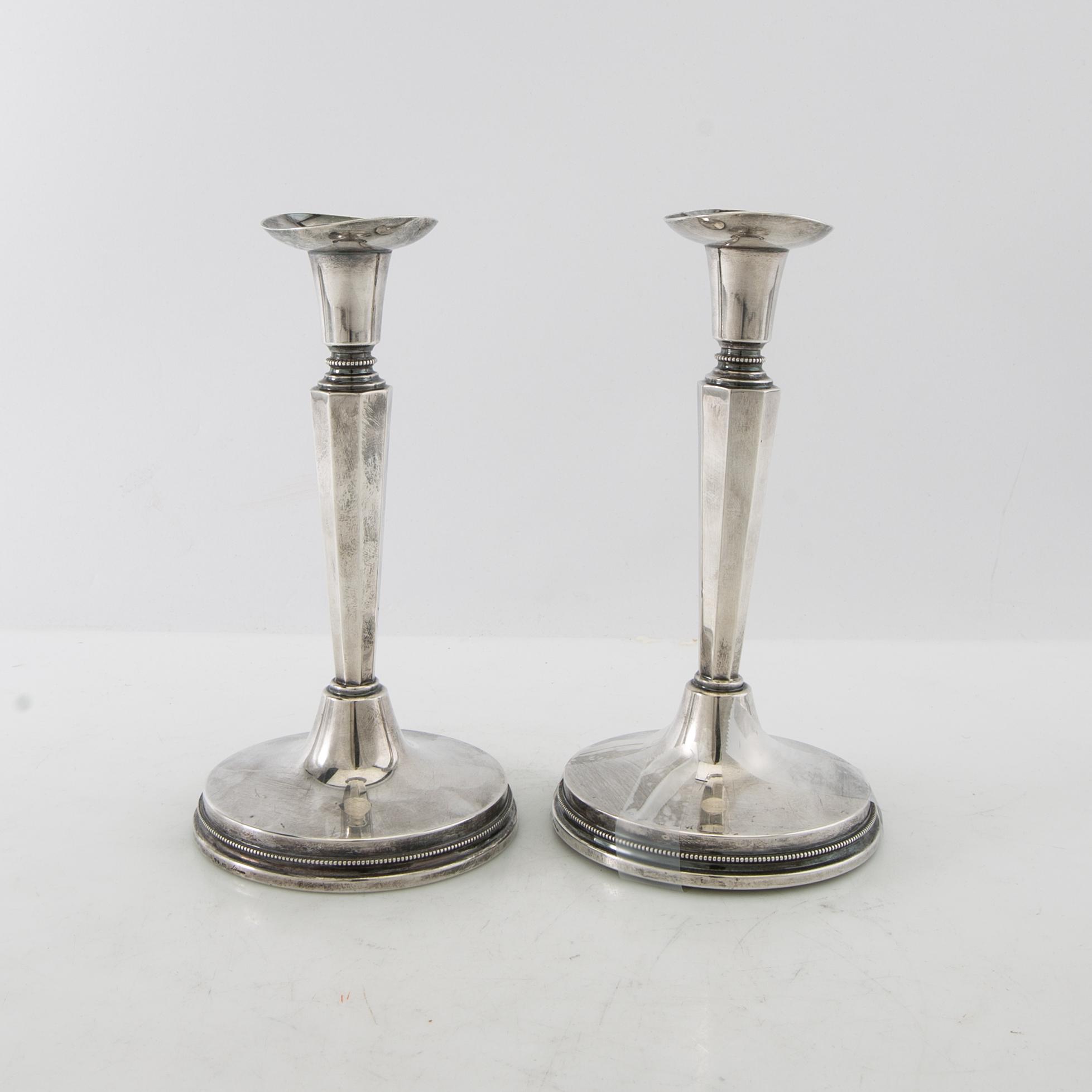 Eric Löfman, candlesticks, a pair, silver, MGAB, Uppsala, 1974.